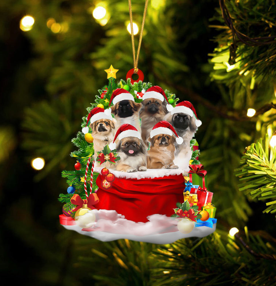 Pekingese Dogs In A Gift Bag Christmas Ornament